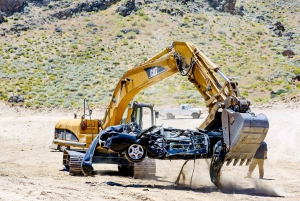 Aplastar y agarrar una excavadora