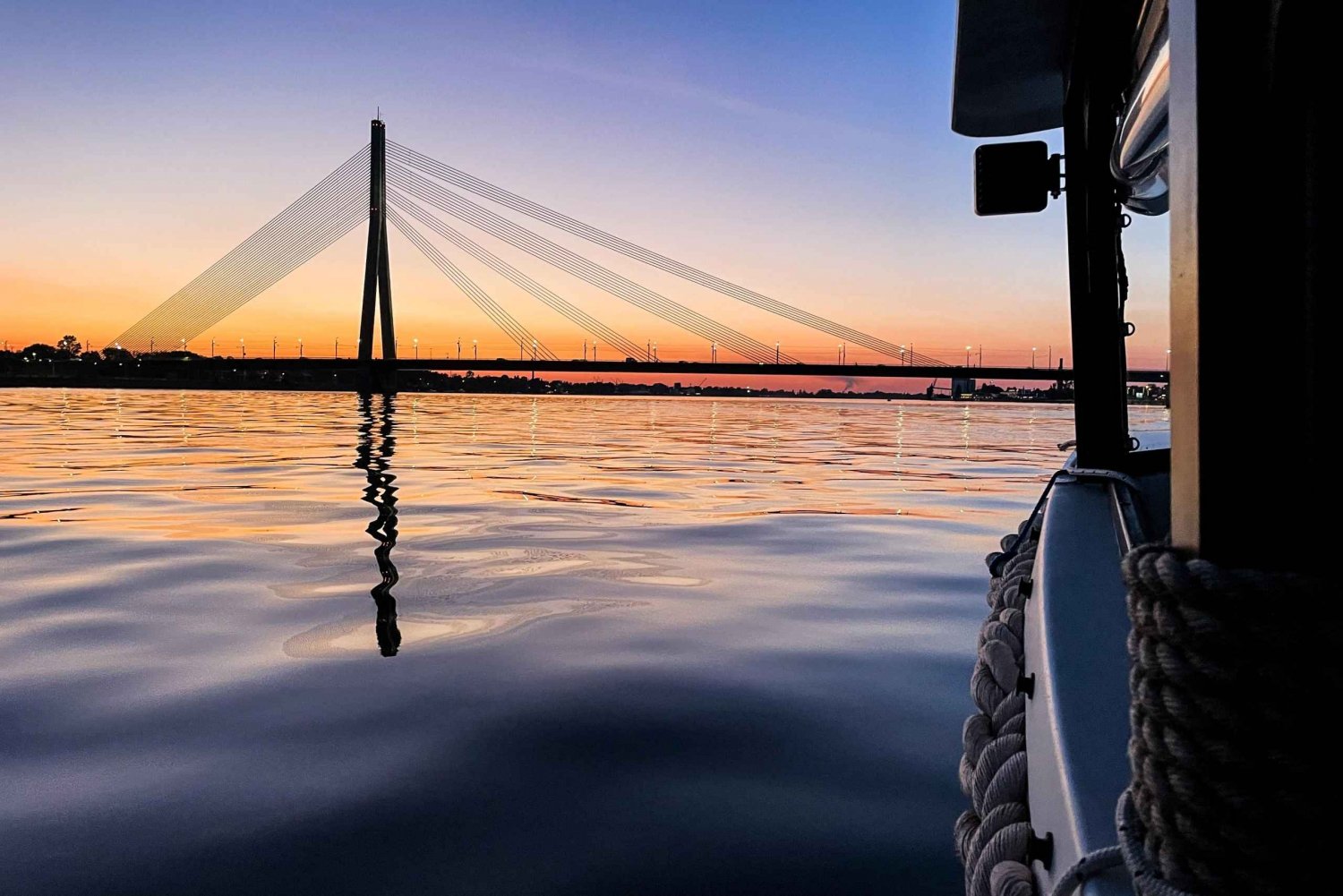 Riga: Riga Canal and Daugava River Sunset Boat Cruise