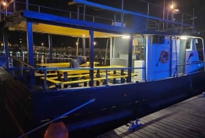 Cascais: crociera al tramonto a Lisbona con open bar