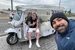 Discover beautiful Lisbon aboard a tuk tuk