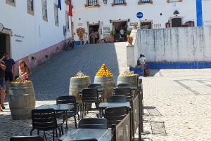 Vanuit Lissabon: Nazaré en Óbidos Privétour in een premium auto