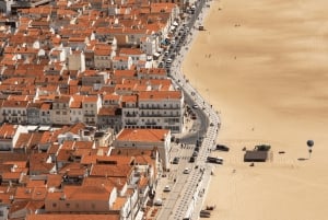 From Lisbon: Tour to Óbidos and Nazaré - Medieval Village, Ginja, and Giant Waves