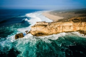 From Lisbon: Tour to Óbidos and Nazaré - Medieval Village, Ginja, and Giant Waves