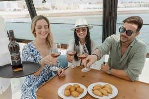 Giro in barca a Lisbona con degustazione di vini e cibi tradizionali