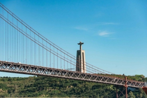 Lisbon: City Skyline Sailboat Cruise with Drink and Snacks