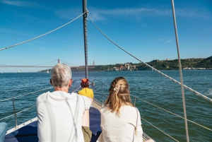 Lisbon: City Skyline Sailboat Cruise with Drink and Snacks