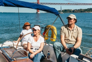 Lisbon: City Skyline Sailboat Cruise with Drink and Snacks