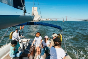 Lisbon: City Skyline Sailboat Cruise with Drink and Snacks