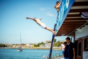 Lisbon: Sightseeing Cruise with Open Bar, DJ & Swim Stop