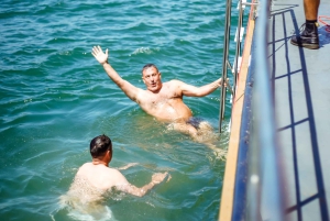 Lisbon: Cruise to the Beach with BBQ, Open Bar and Music