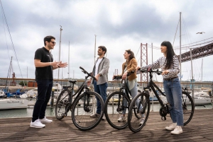 Lisbon: Guided Bike Tour, Helicopter Flight, and Boat Trip