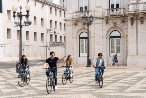 Lisbon: Guided Bike Tour, Helicopter Flight, and Boat Trip