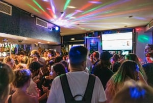 Lisbon: Pub Crawl with Open Bar, Shots, & VIP Club Entry