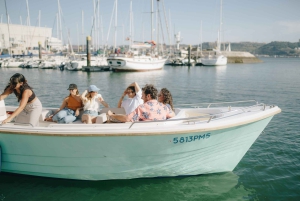 Rondvaart bij zonsondergang in Lissabon met lokale hapjes en drankjes