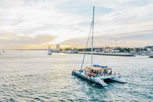 Lisbon: Sunset Catamaran Tour with Music and a Drink