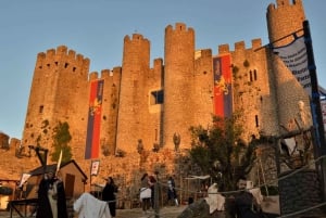 Lissabon till Porto med upp till 4 stopp: Óbidos, Nazaré, Fátima och Aveiro