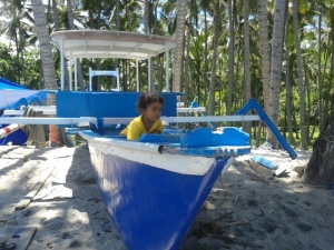 Girl playing on a boat