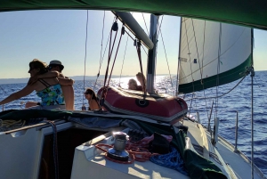 From Kassandra: Sunset Sailing boat tour & swiming stop
