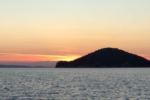 From Kassandra: Sunset Sailing boat tour & swiming stop