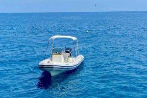 Madeira :Private boat trip along the coast w/ water activity