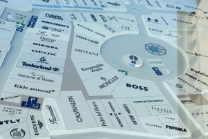 Designer Outlet -shoppailu + VIP Tesla X 360° kaupunkikierros