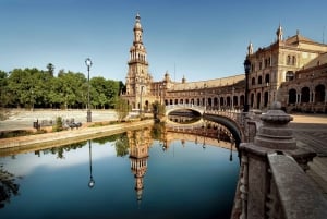 From Malaga: Seville Day Trip Guide Commentary on the Bus