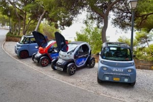 Málaga: Electric Car Guided Tour with Cueva del Tesoro Entry