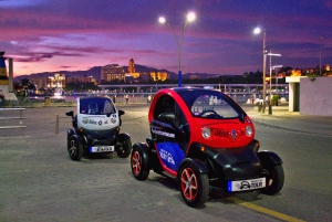 Malaga: Sunset to Night Tour by Electric Car