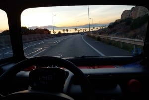 Rondrit in Malaga met de elektrische auto.Geniet van de zonsondergang