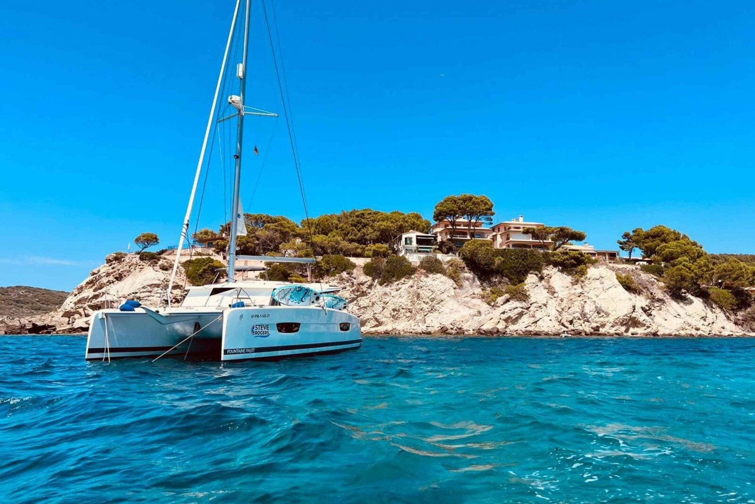 From Palma: Luxury Catamaran Tour with Tapas & Swimming