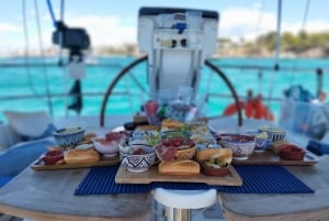 Baia di Palma: Gita in barca a vela con giochi d'acqua, snack e bevande