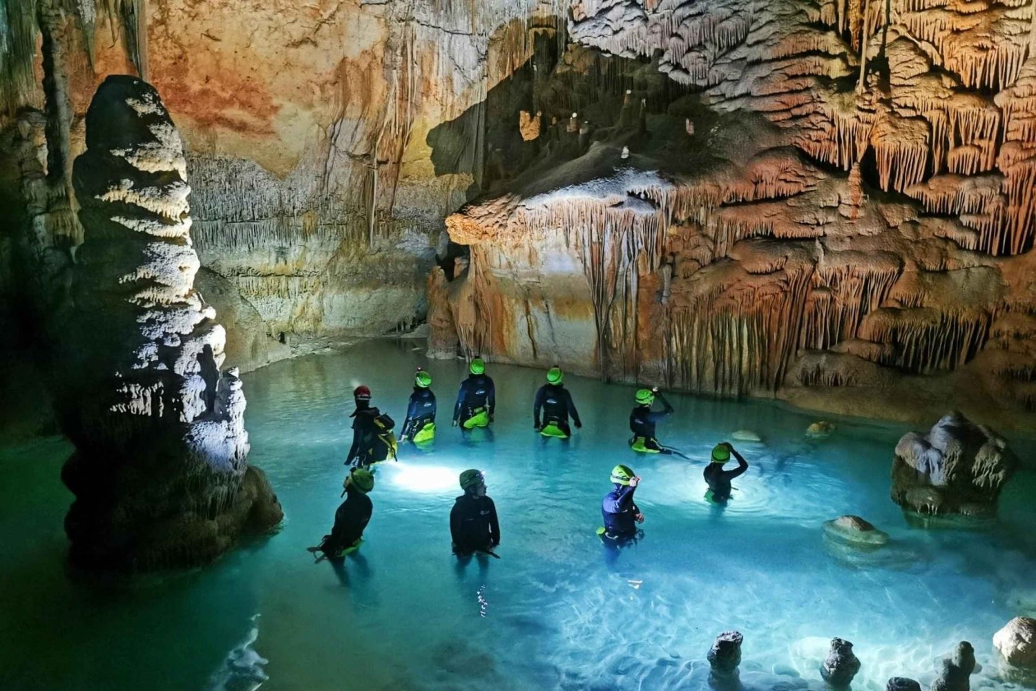Sea cave with abseiling (rappel)