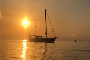 Sonnenaufgang Paddelsurfen auf Menorca