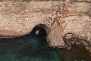 Tour privado en barco por la Laguna Azul, la Laguna de Cristal y las Cuevas de Comino