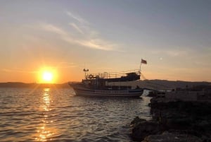 Bugibba: cruzeiro panorâmico ao pôr do sol com parada para mergulho na lagoa azul
