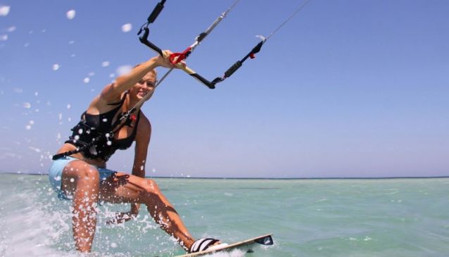 Drive to Tarifa and try kite-surfing on the white sandy beaches