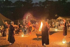 Marrakech: quadrijden en kameelrijden, dinershow in de Agafay-woestijn