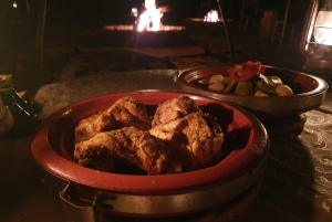 Doświadczenie w Agafay: kolacja z przejażdżką na wielbłądzie lub quadem o zachodzie słońca