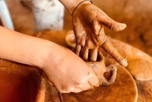 Tilbring en naturlig dag uden for Den Røde By: keramik, gåtur, pool