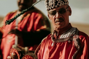 Deserto: Passeio de quadriciclo, passeio de camelo, show de fogos, jantar e música