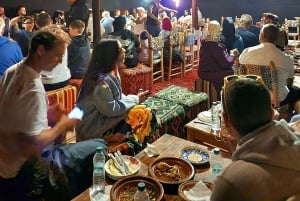 Marrakech: Giro in cammello e cena con spettacolo di fuoco ad Agafay
