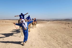 Marrakech: Giro in cammello e cena con spettacolo di fuoco ad Agafay