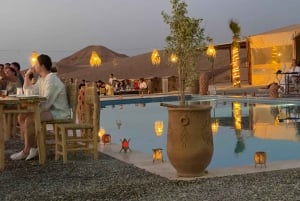 Marrakech: Agafay-ørkenens ridetur på kamel med middag og solnedgang