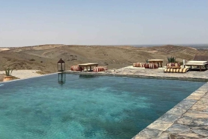 Marrakech: tramonto nel deserto di Agafay, giro in cammello, cena e spettacolo