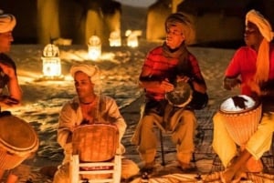 Marrakech: Puesta de sol en Agafay con cena, espectáculo y música tuareg