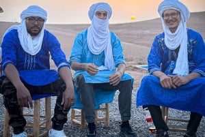 Marrakech: Puesta de sol en Agafay con cena, espectáculo y música tuareg