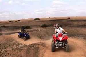 Marrakech: Quad e cammelli al tramonto e cena con spettacolo del fuoco