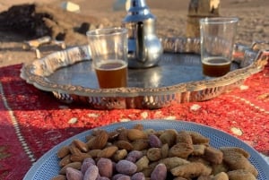 Marrakech: Quad, paseo en camello, puesta de sol, cena con espectáculo