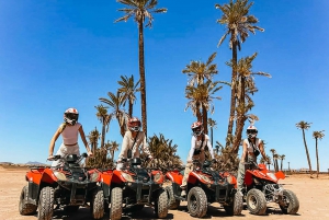 Marrakech: Tour in quad all'oasi delle palme e al deserto di Jbilat