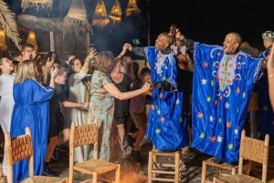 Dîner-spectacle dans le désert et balade à dos de chameau au coucher du soleil